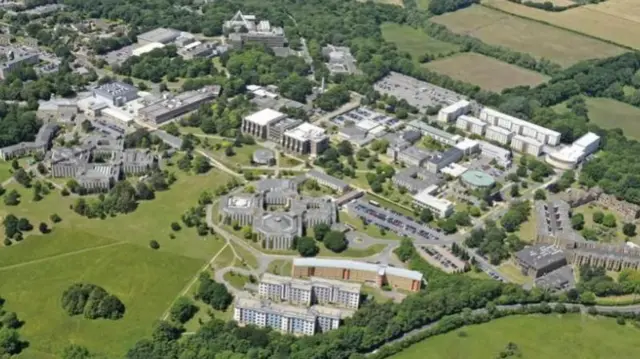 An birdseye view of a leafy university campus.