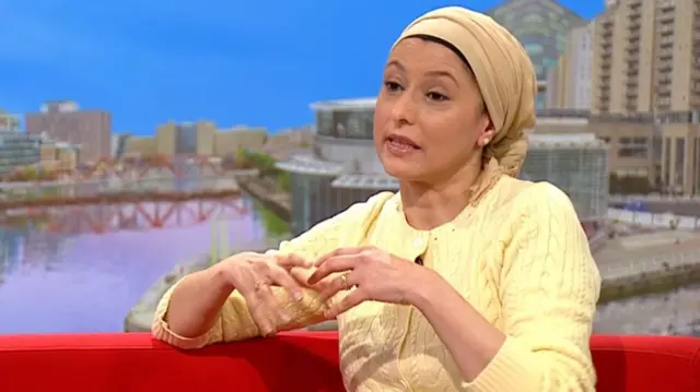 GP Dr Fari Ahmed mid-speaking as she sits on the BBC Breakfast sofa