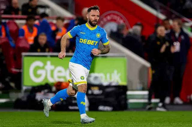 Adam Armstrong of Wolverhampton Wanderers looks on
