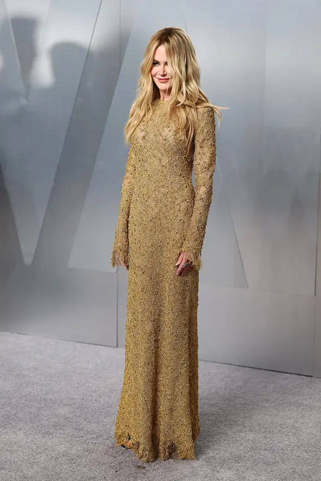 Nicole Kidman in a gold/brown dress