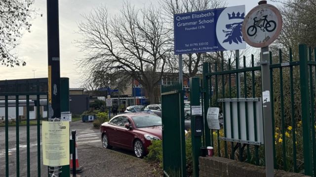 Entrance to Queen Elizabeth's Grammar School in Faversham, view of the main building from the parking lot