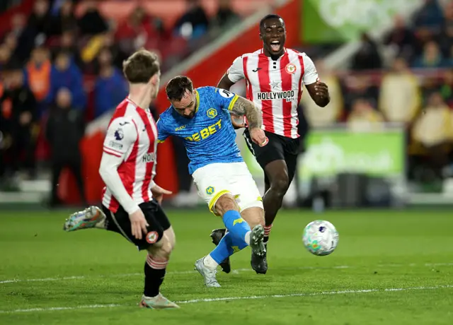 Adam Armstrong of Wolverhampton Wanderers scores his team's first goal