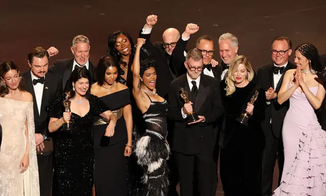 Cast and makers on One Battle After Another on stage at the Oscars.