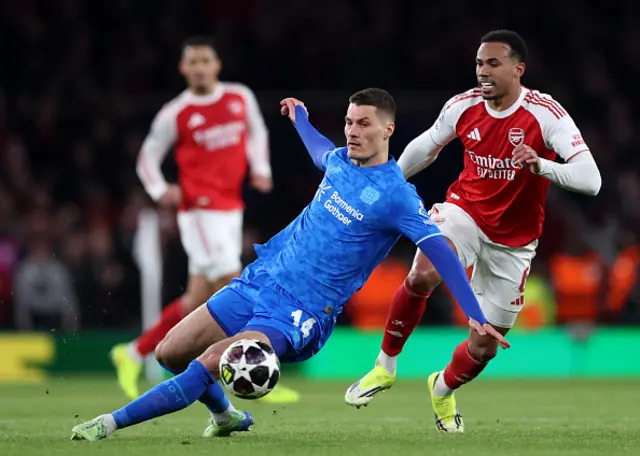 Patrik Schick of Bayer 04 Leverkusen and Gabriel of Arsenal battle for possession