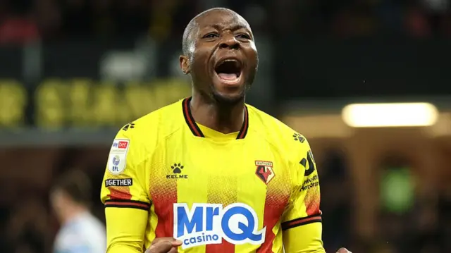 Edo Kayembe celebrates