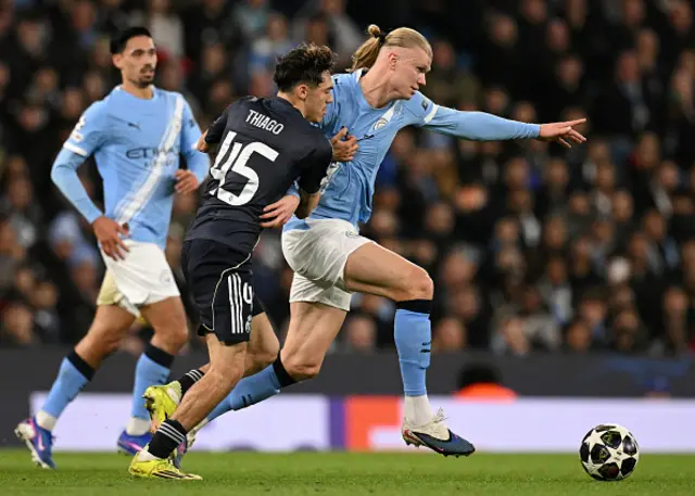 Thiago Pitarch (C) view with Manchester City's Norwegian striker Erling Haaland