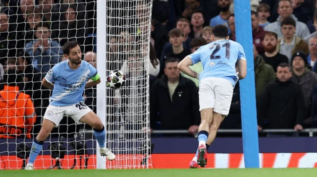 Bernardo Silva of Manchester City makes a clearance on the goal line