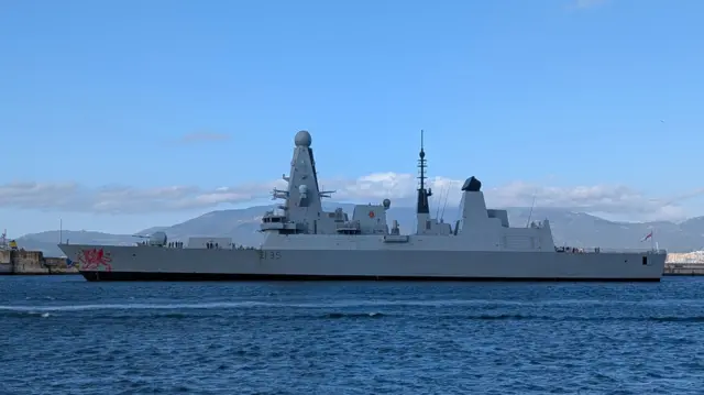 A side-on view of HMS Dragon in Gibraltar