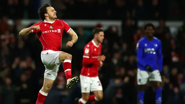 Ollie Rathbone celebrates equaliser against Watford