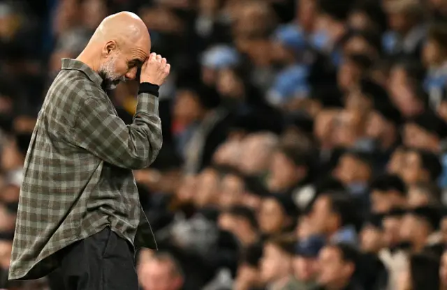 Pep Guardiola reacts
