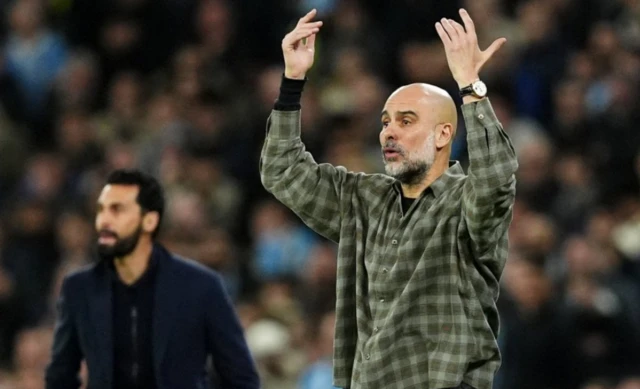 Manchester City manager Pep Guardiola gestures on the touchline