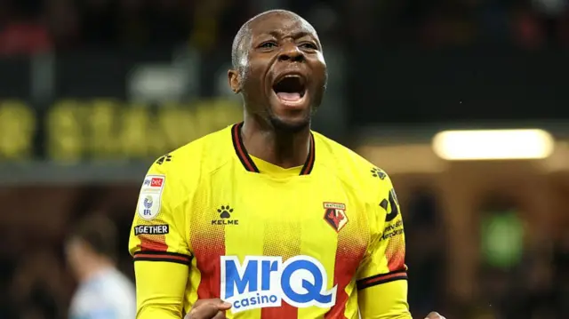 Edo Kayembe celebrates