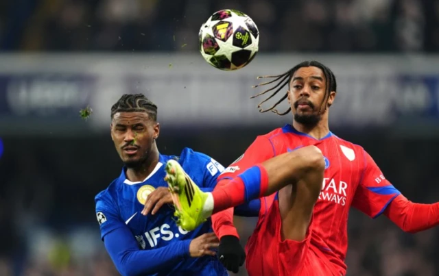 Chelsea's Jorrel Hato (left) and Paris Saint-Germain's Bradley Barcola battle for the ball