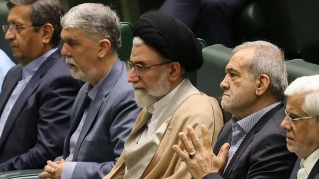 Intelligence Minister Esmail Khatib sitting amongst members of parliament
