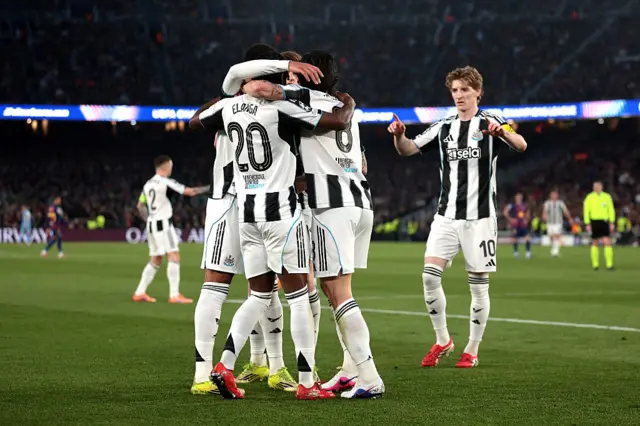 Newcastle players celebrate scoring