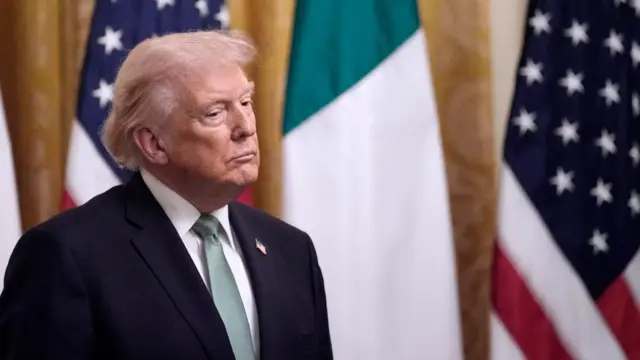 US President Donald Trump in a suit and tie