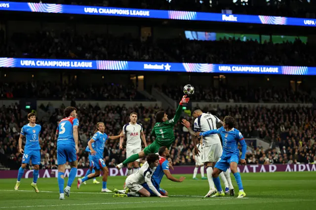 Juan Musso parries the ball away