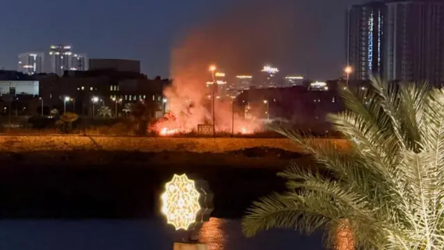 Smoke and fire rise during reported strikes on the US embassy in Baghdad