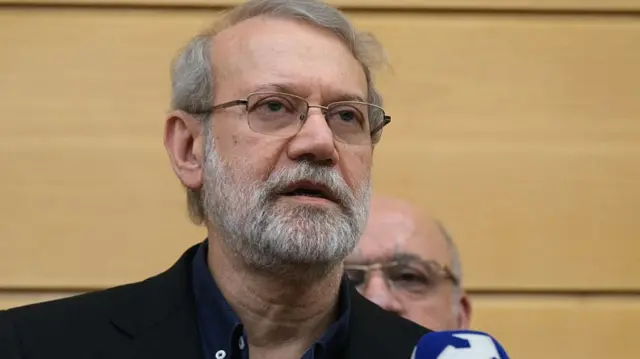 Ali Larijani speaking to the press