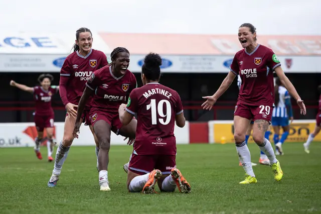 West Ham celebrate their late winner v Brighton