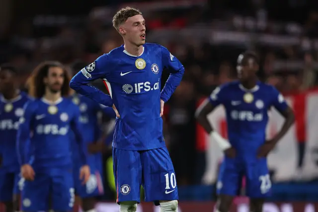Cole Palmer looks dejected after Chelsea lose to PSG in Champions League