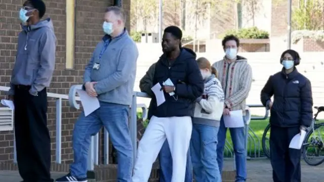 Students queuing for antibiotics at the University of Kent in Canterbury