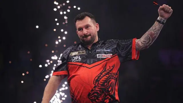 Jonny Clayton celebrates