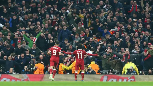 Mohamed Salah celebrates in front of Liverpool fans at Man City