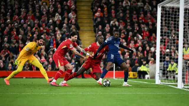 Ousmane Dembele scores against Liverpool at Anfield