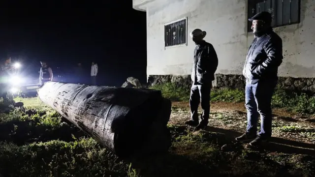 A general view of the Iranian missile that fell in the village of Ayn Farha after being destroyed by air defense systems in the Quneitra province of southern Syria.
