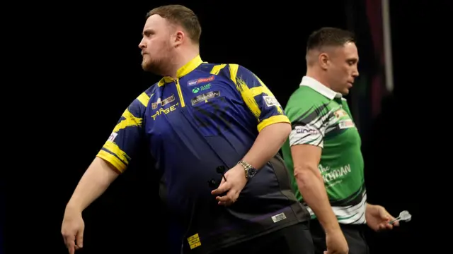 Luke Littler (left) during the final against Gerwyn Price on night seven of the BetMGM Premier League 2026 at the 3Arena in Dublin, Ireland