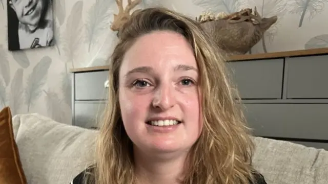Emily Hotchkiss smiles at the camera