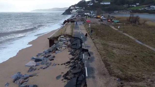 The A379 in Torcross which has been washed away during stormy weather