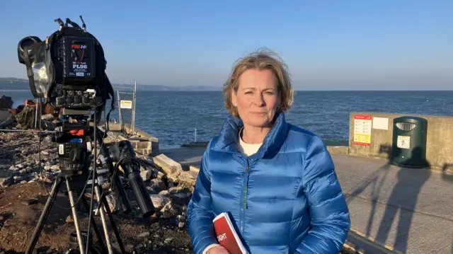 Victoria Graham stood in front of the crumbling sea wall.