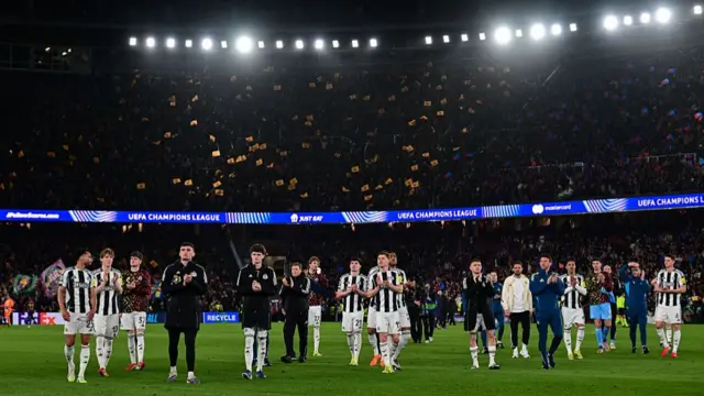 Newcastle players applaud travelling Magpies fans