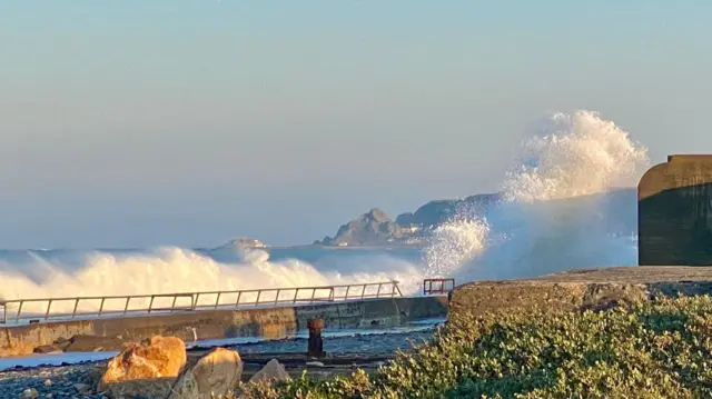 Waves crash into St Ouen's Bay
