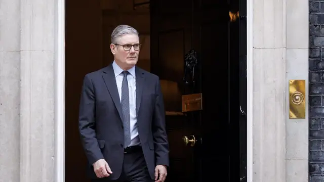 Prime Minister Keir Starmer in a dark blue suit at No 10 Downing Street.