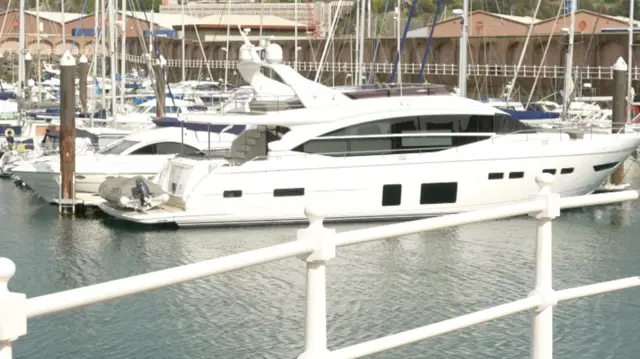 Yachts moored up at a marina