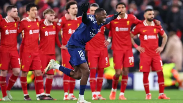 Ousmane Dembele runs off to celebrate after PSG beat Liverpool on penalties