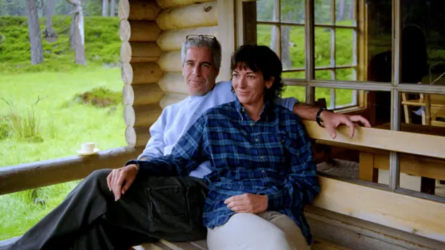 Ghislaine Maxwell and Jeffrey Epstein are seen in this image released by the Department of Justice in Washington, D.C., U.S., on December 19, 2025 as part of a new trove of documents from its investigations into the late financier and convicted sex offender Jeffrey Epstein. U.S. Justice Department/Handout via REUTERS THIS IMAGE HAS BEEN SUPPLIED BY A THIRD PARTY