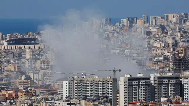 Smoke rises after an Israeli strike on Beirut's southern suburbs, following an escalation between Hezbollah and Israel