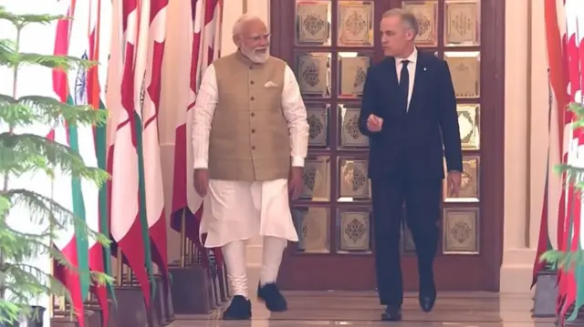 Modi (left) and Carney at Hyderabad House in Delhi, where they will hold official talks