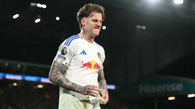 Joe Rodon reacts as he leaves the pitch, substituted