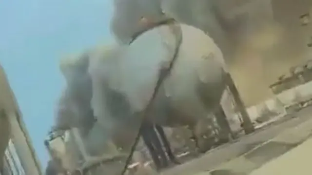 A screengrab taken from the verified video showing smoke at the Saudi oil refinery