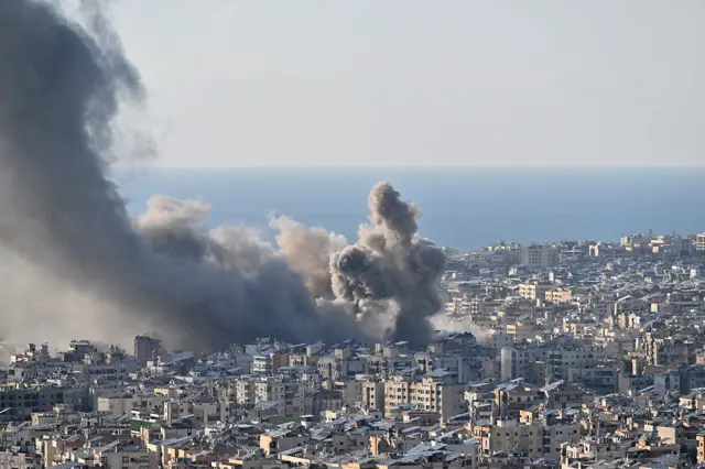 Smoke rises over buildings following intense Israeli airstrikes targeting the Burj al-Barajneh area in southern Beirut, Lebanon