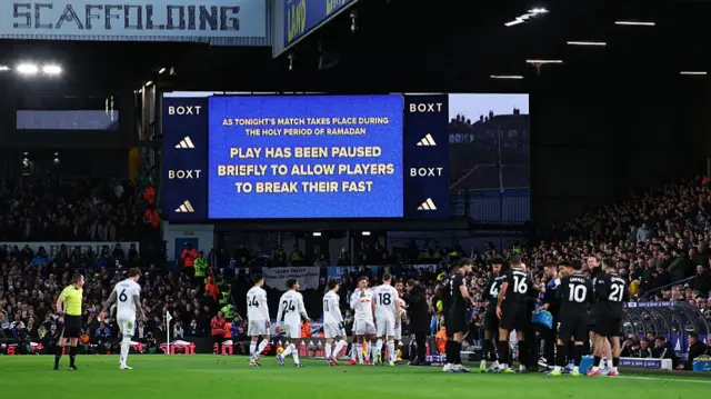 A message is seen on the LED screen as break in play to allow players to break their fast during Ramadan during the Premier League match between Leeds United and Manchester City at Elland Road
