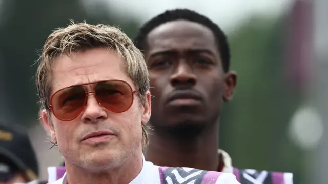Brad Pitt and Damon Idris in F1 costumes