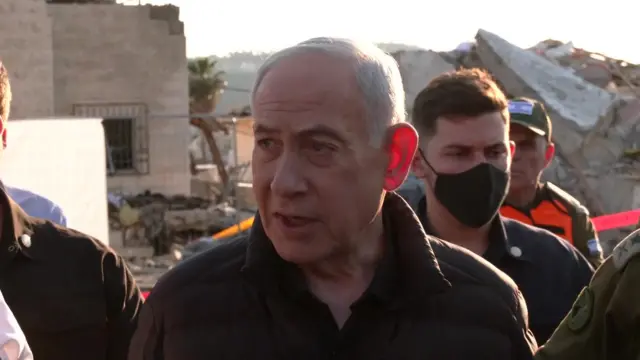 Netanyahu speaking to reporters