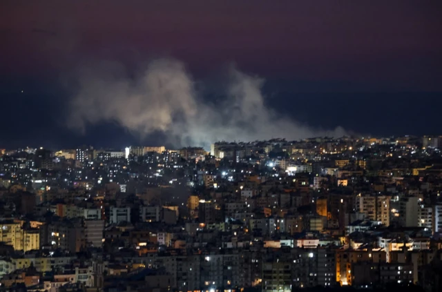 Smoke rises over Beirut following a fresh wave of strikes on the Lebanese capital