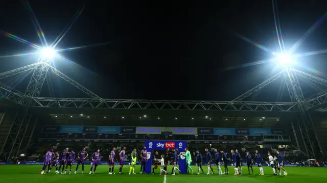 Players from Preston and Stoke line up before kick-off